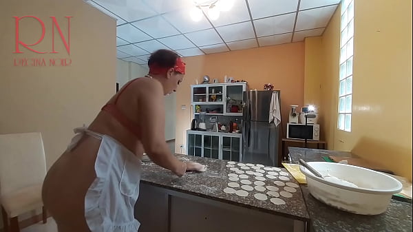 Nudist Housekeeper Regina Noir Cooking at the Kitchen. Naked Maid